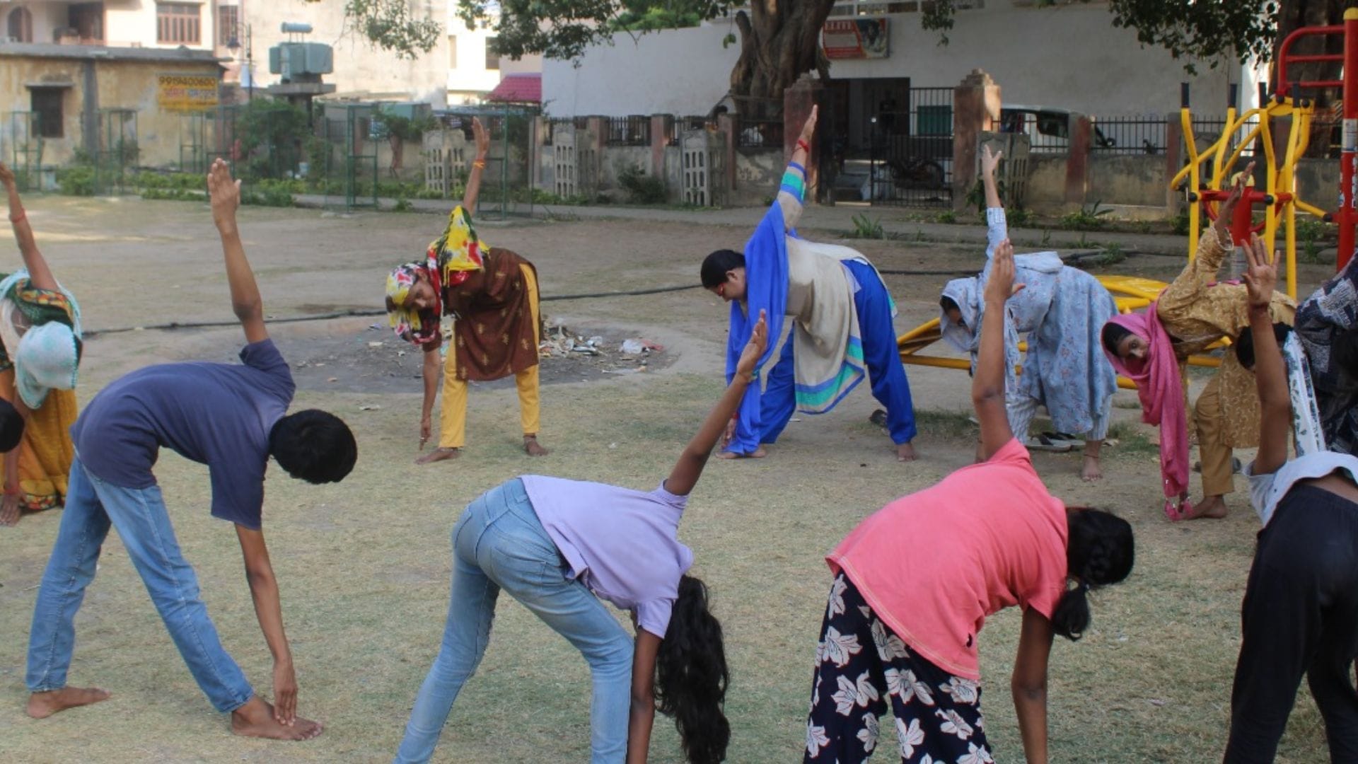 International Yoga Day Poster competition in slums of varanasi benefits pranayama explained