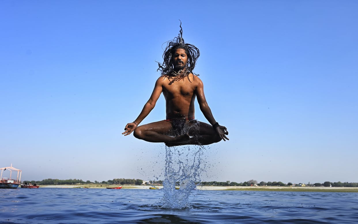 International Yoga Day 2024  people yoga in Kashi vishwanath temple and  ganga ghat