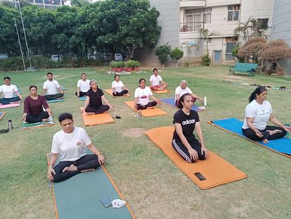 People participate on International Yoga Day.