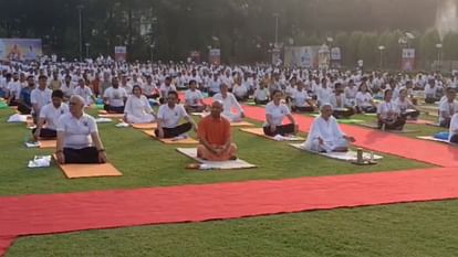 People participate on International Yoga Day.