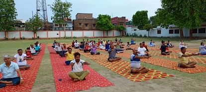 People participate on International Yoga Day.