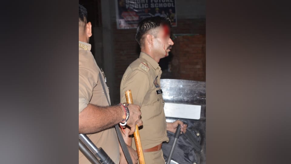 Firozabad riot Pictures Dozens of vehicles including an ambulance were vandalized arson was done