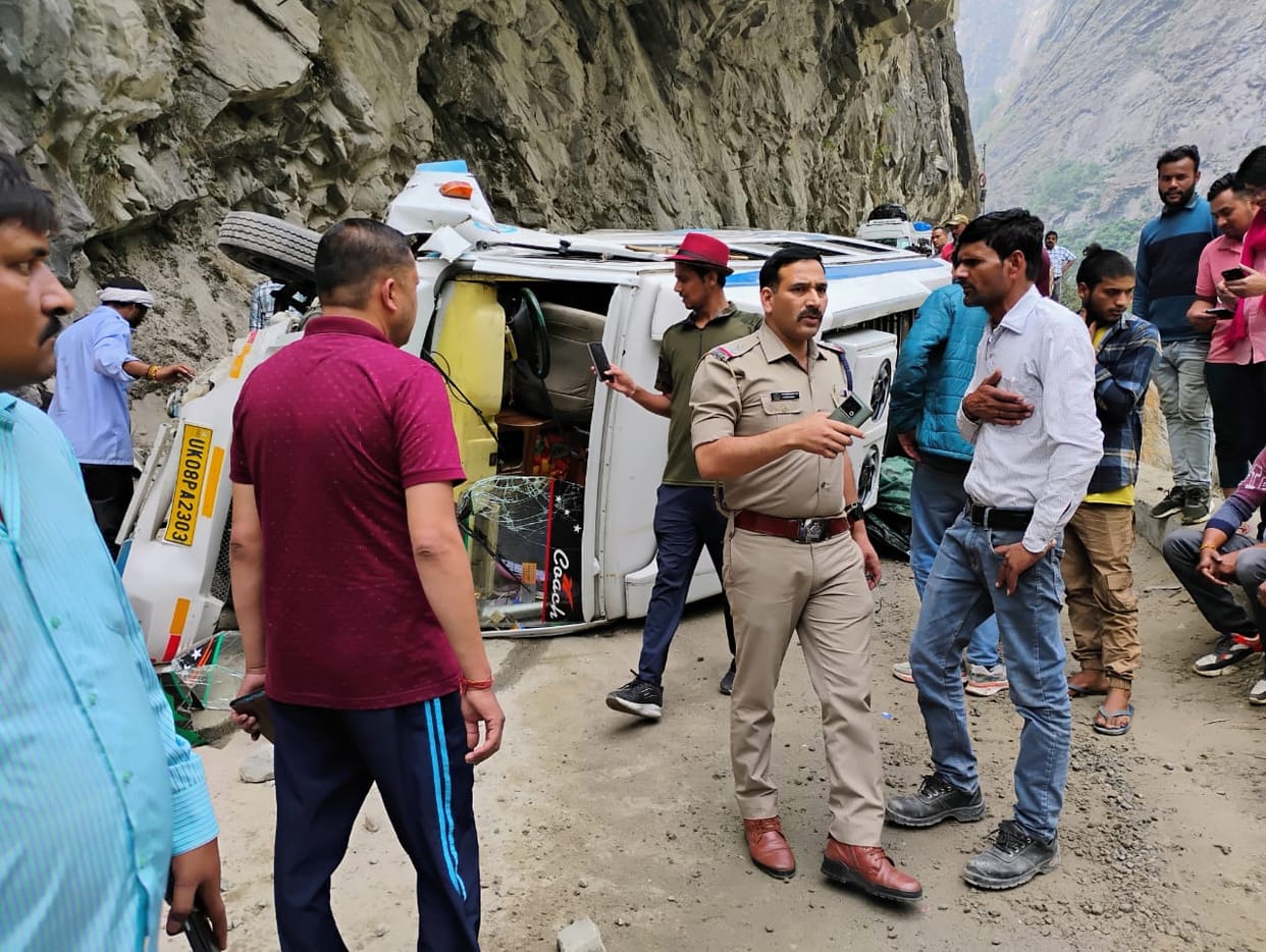 Badrinath Highway Accident Tempo Traveller full of passengers overturned on road after hitting a hill