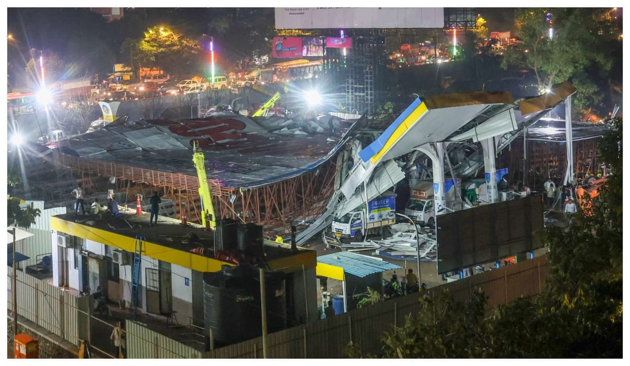 mumbai hoarding accident case maharashtra government suspend ips officer