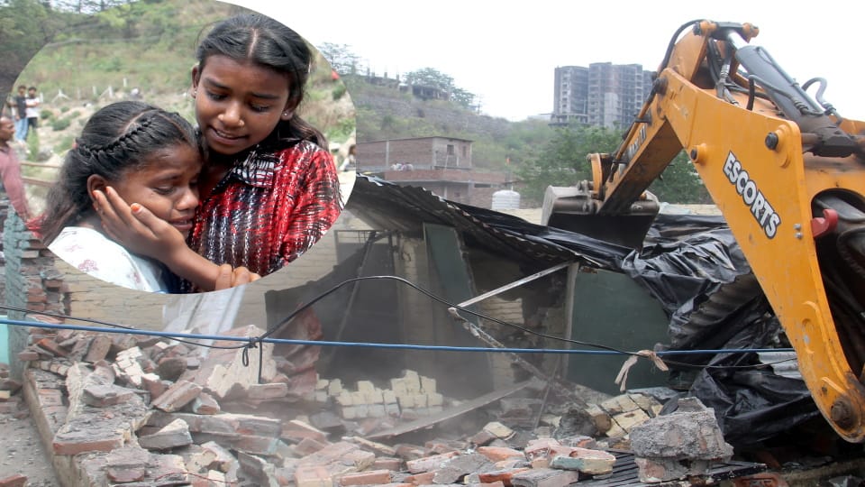 Dehradun encroachment bulldozer run in kathbangla slum colony Woman dies due to shock people block road