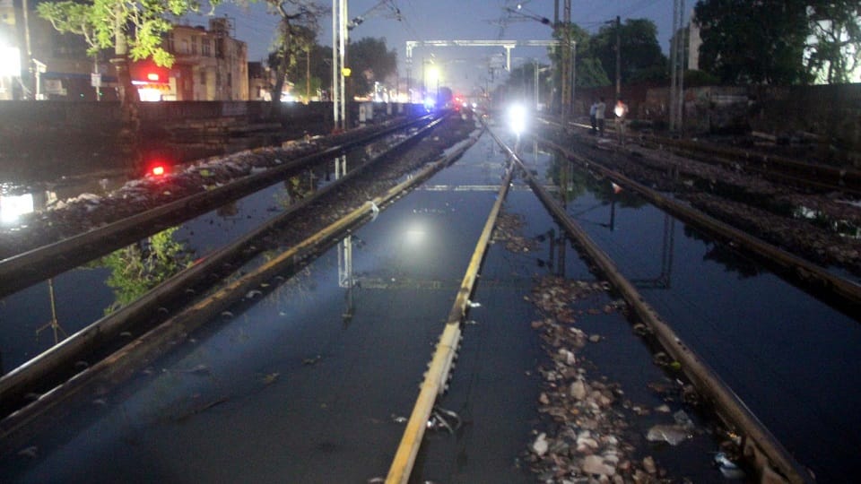Boundary wall broken, water reached railway track
