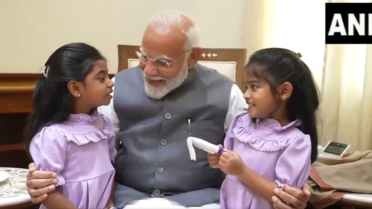 Prime Minister Narendra Modi receives two special visitors at his office in Parliament