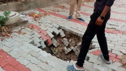 rain in Varanasi 12 hour power cut and 22 roads caved and 29 localities flooded