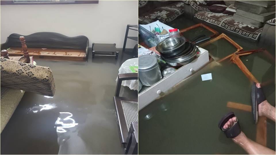 pictures of Heavy Rain In Delhi Roads Flooded Car Submerged Traffic Crawls