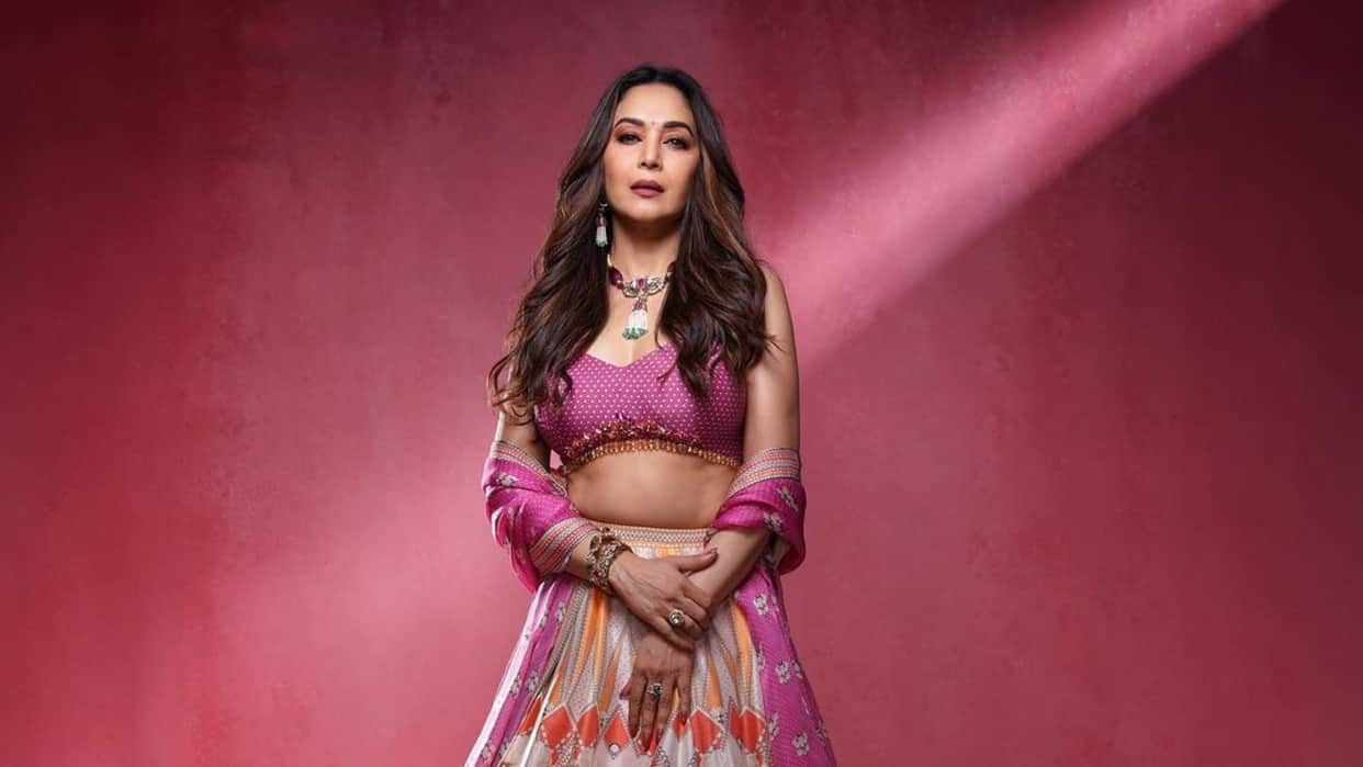 Fans Surprise To See Madhuri Dixit Washing Her Own Car In America
