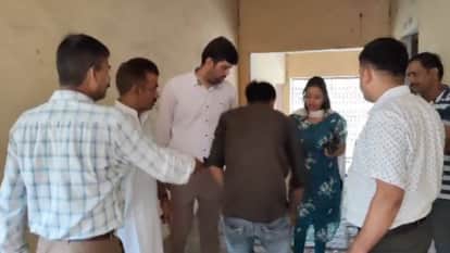 Jiwaji University Tehsildar reached among students openly cheating in university exam