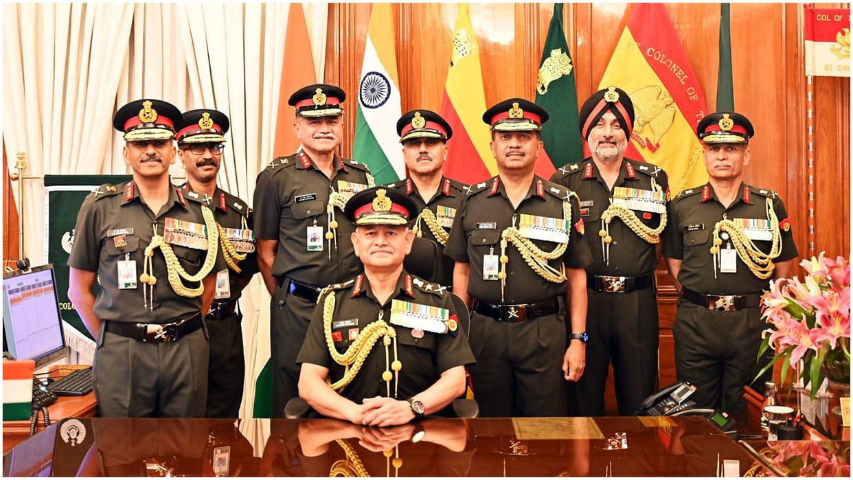 Army Chief General Upendra Dwivedi touches the feet of his brother and other relatives as he takes over Charge