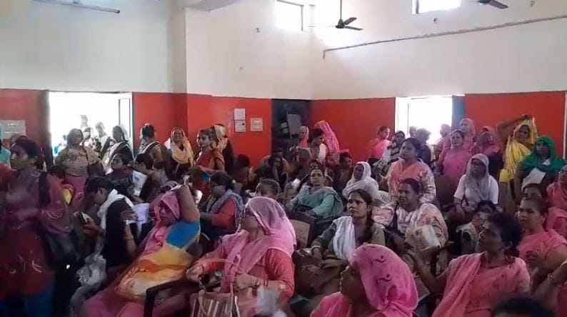 Asha-Sangini and Anganwadi worker shivered from the heat
