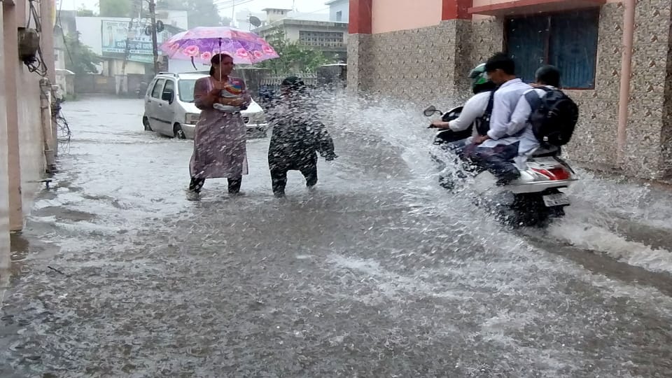Heavy rain, city flooded, lightning strikes, transformers blown