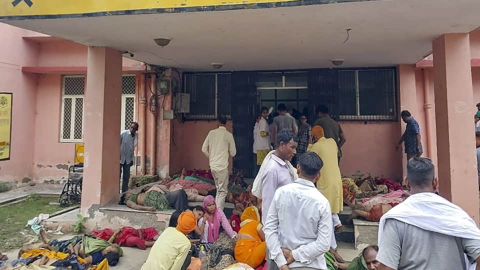 hathras stampede ground report see pictures People kept searching for their loved ones in pile of dead bodies