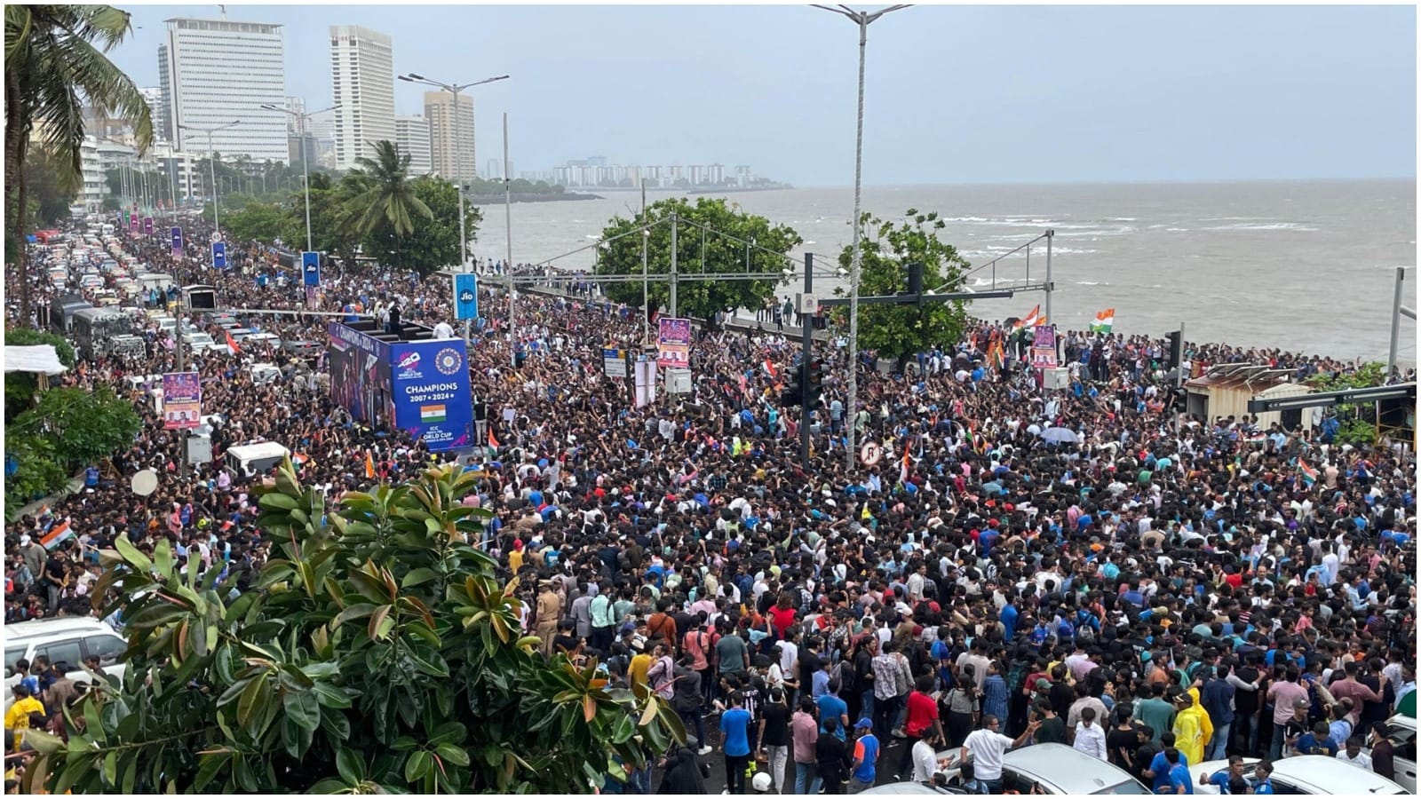 Team India: Water cannon salute to flight Team India celebration victory parade photos in Mumbai Marine Drive