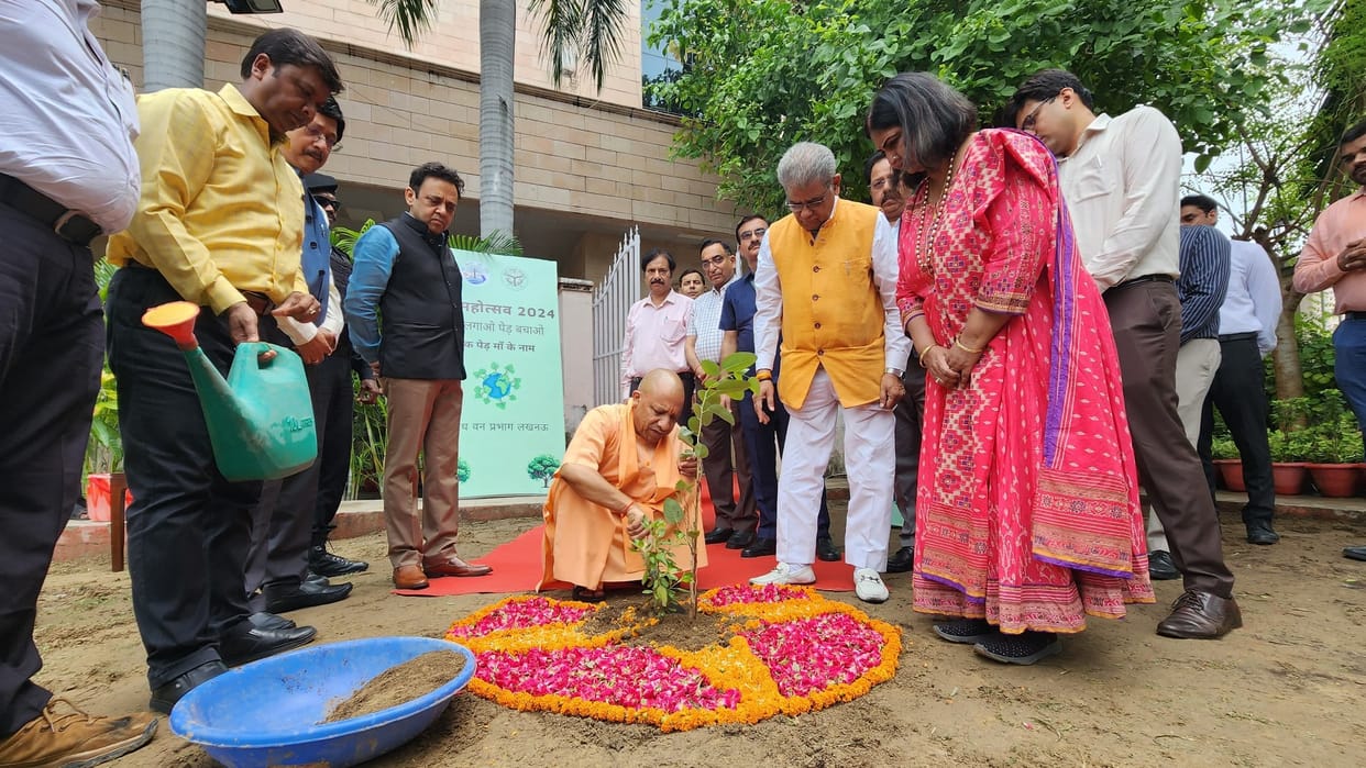 CM Yogi Adityanath plants a tree under the scheme of One tree for mother.