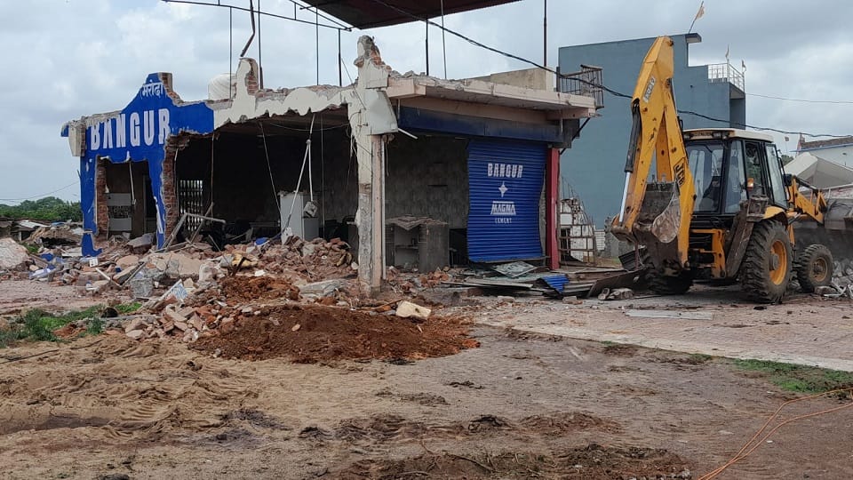 Police action against vigilant miscreants administration bulldozer runs on encroachment by history sheeter in