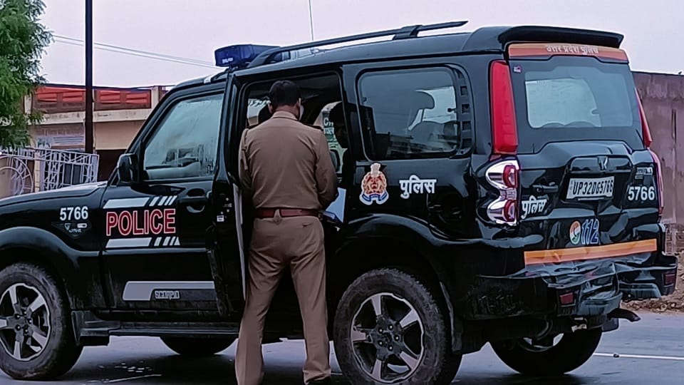 Truck hits police vehicle, policeman narrowly escapes