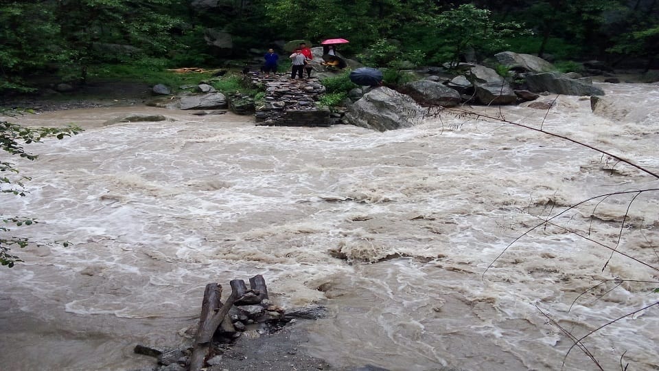 Wooden bridge connecting Teejam and Watan villages washed away