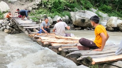 Wooden bridge connecting Teejam and Watan villages washed away