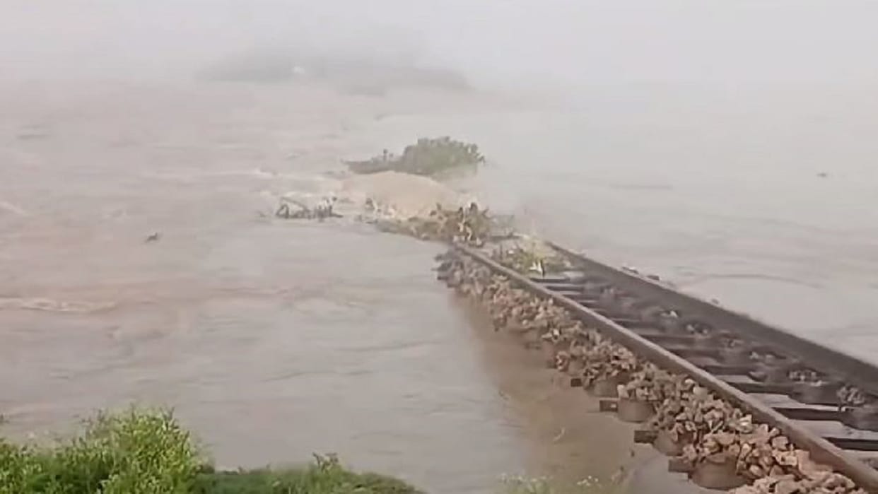 Railway track damaged due to flood water on Mailani-Palia railway section in Lakhimpur