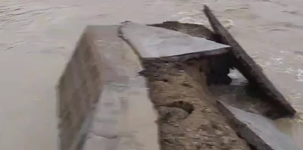 Part of the check dam being built on the Ishan river was washed away, construction started a year ago