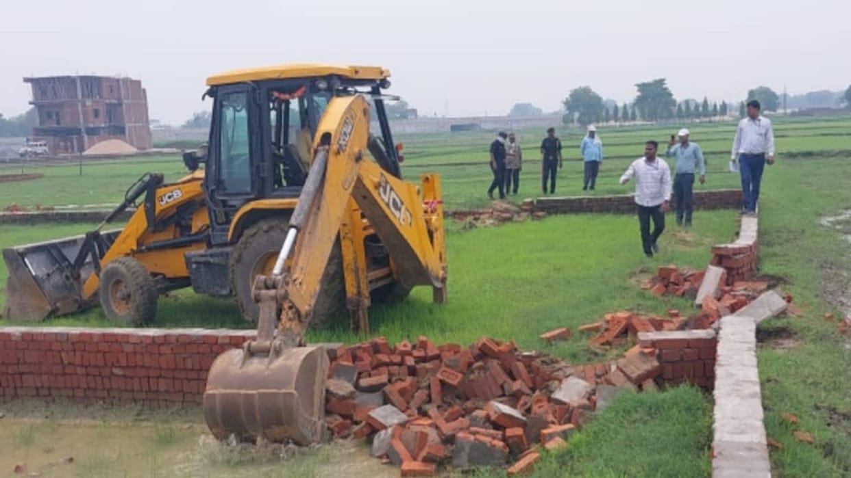 VDA bulldozer five plots of 45 bighas demolished nine illegal constructions sealed action taken against three
