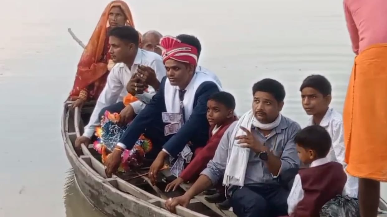Groom went for marriage in a boat in a flood effecte village in Mohammadpur Khala thana in Barabanki.