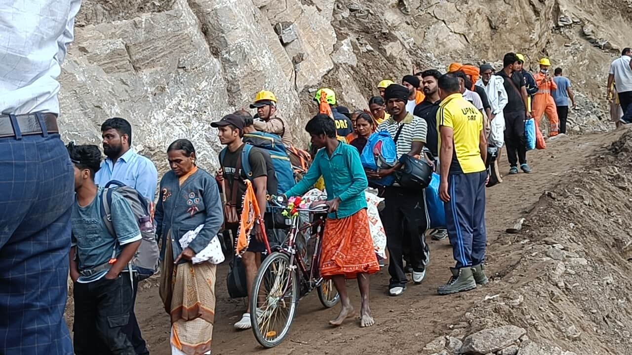 Badrinath Highway opened after 83 hours Pilgrims relief Vehicle Movement Starts Photos