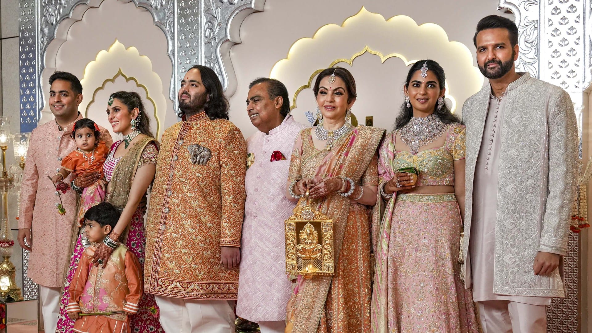 anant ambani radhika merchant wedding looks bridal all outfit details cost designer Abu Jani Sandeep Khosla