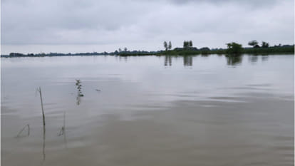Sant Kabir Nagar DM Mahendra Singh Tanwar and SP went about 3 km inside the village by boat, well being people