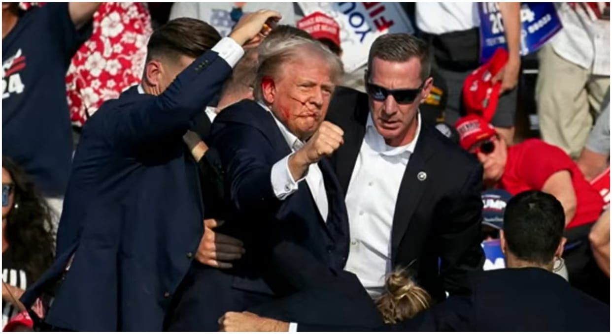 Former US President Donald Trump assassination attempt on life US Secret Service bullet to the ear news update