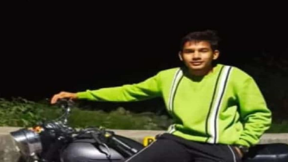 body of a young man found hanging at the stadium gate in Tanakpur