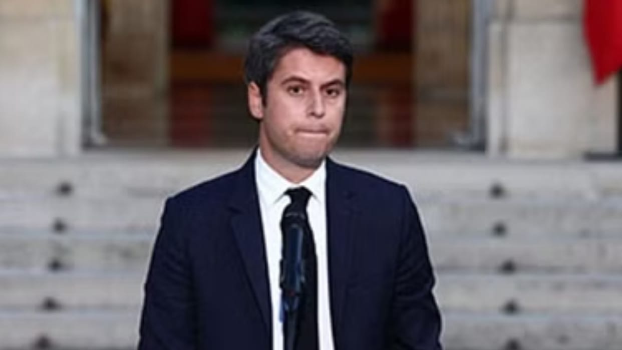 France Macron accepts PM resignation but keeps him as head of caretaker government