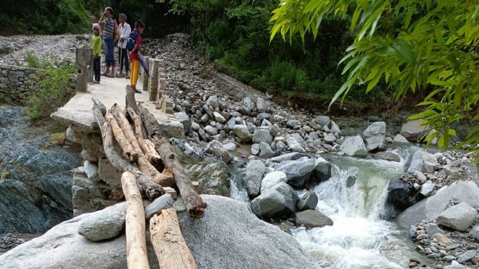 Villagers crossing the river risking their lives in champawat