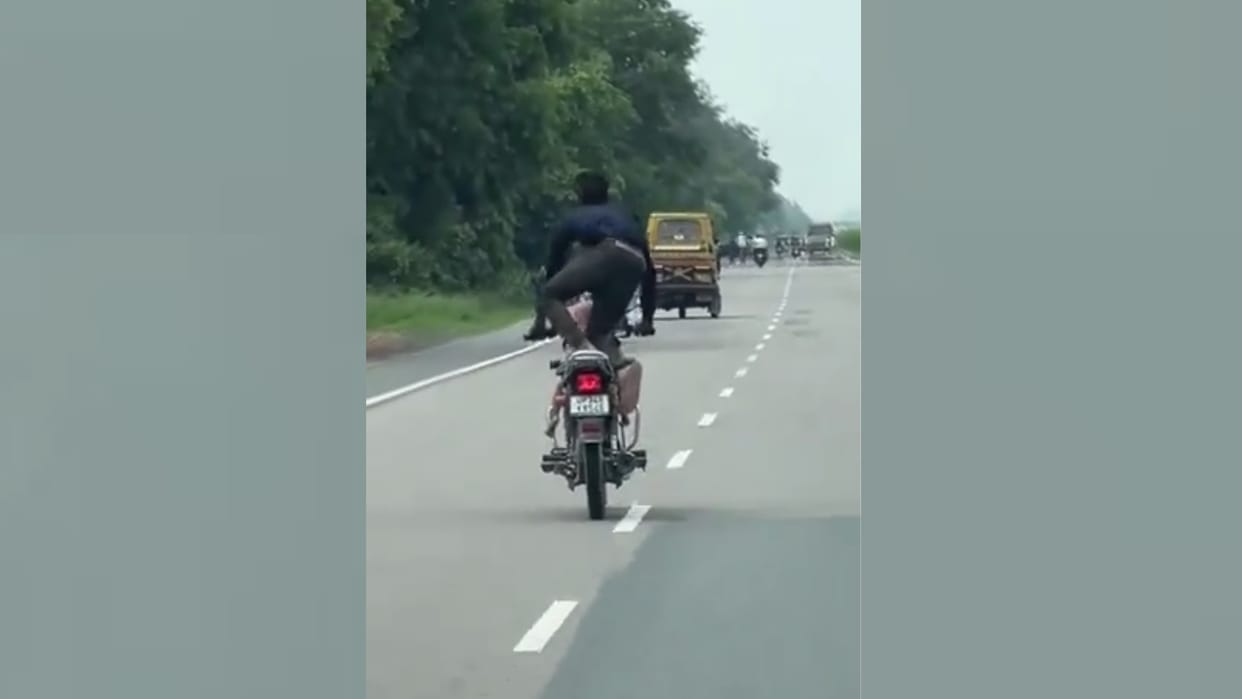 A man was doing stunt with a child on a bike, video went viral.