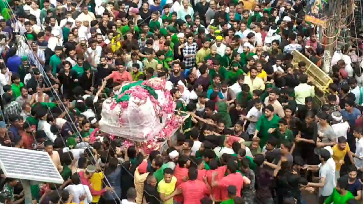 city echoed with the memories of Ali or Hussain, refreshments were served amid tight security