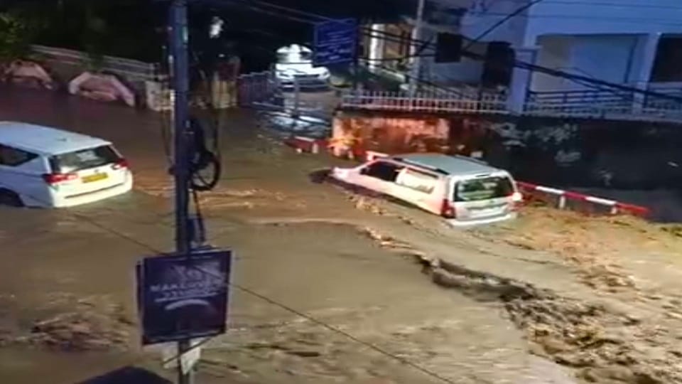 People stuck in two cars in the rain for an hour in haldwani