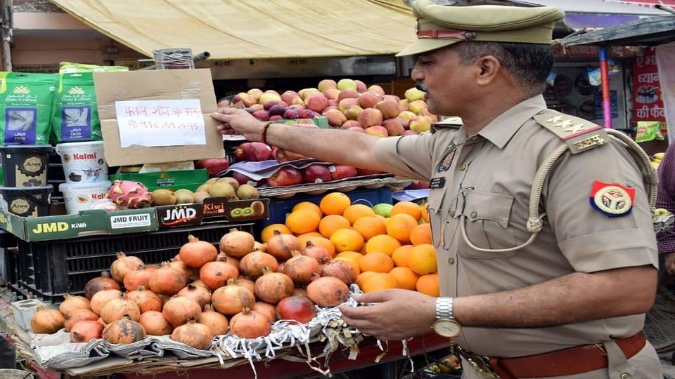 Shopkeepers wrote their names on Kanwar Marg in Aligarh