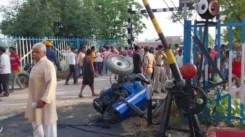 Train dragged tractor for three km fire broke out driver dead gateman negligence in this accident