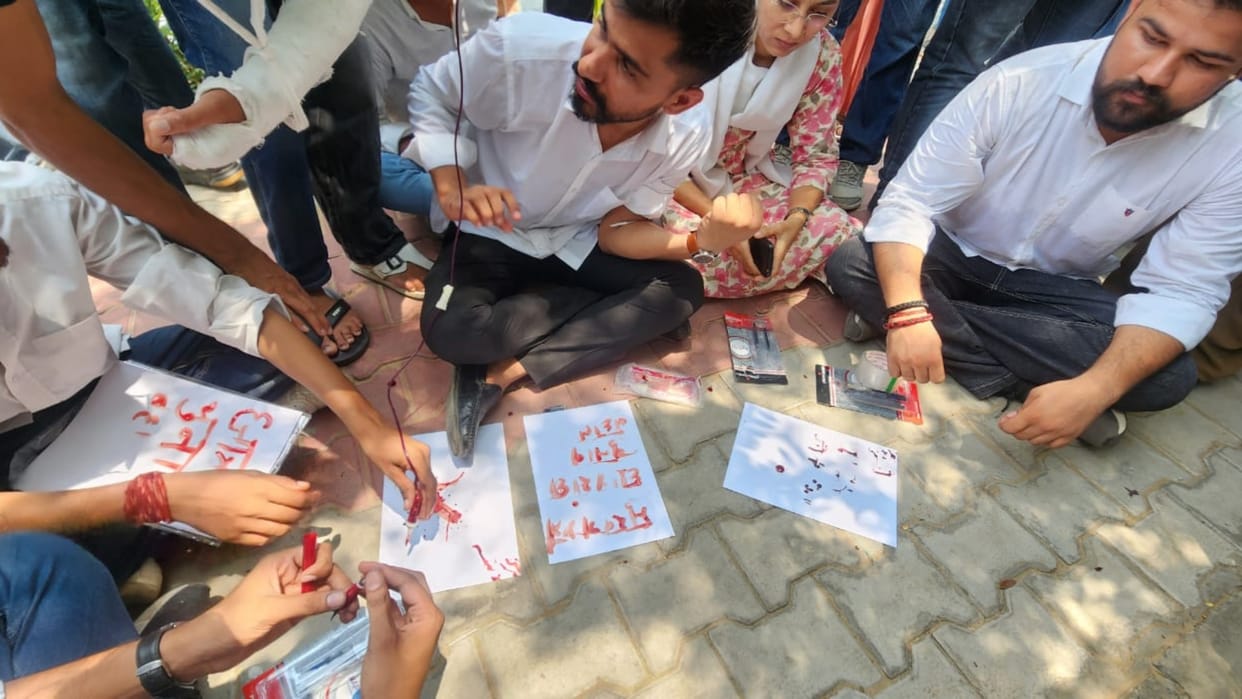 Rajasthan University student leaders wrote a letter in blood demanding student union elections
