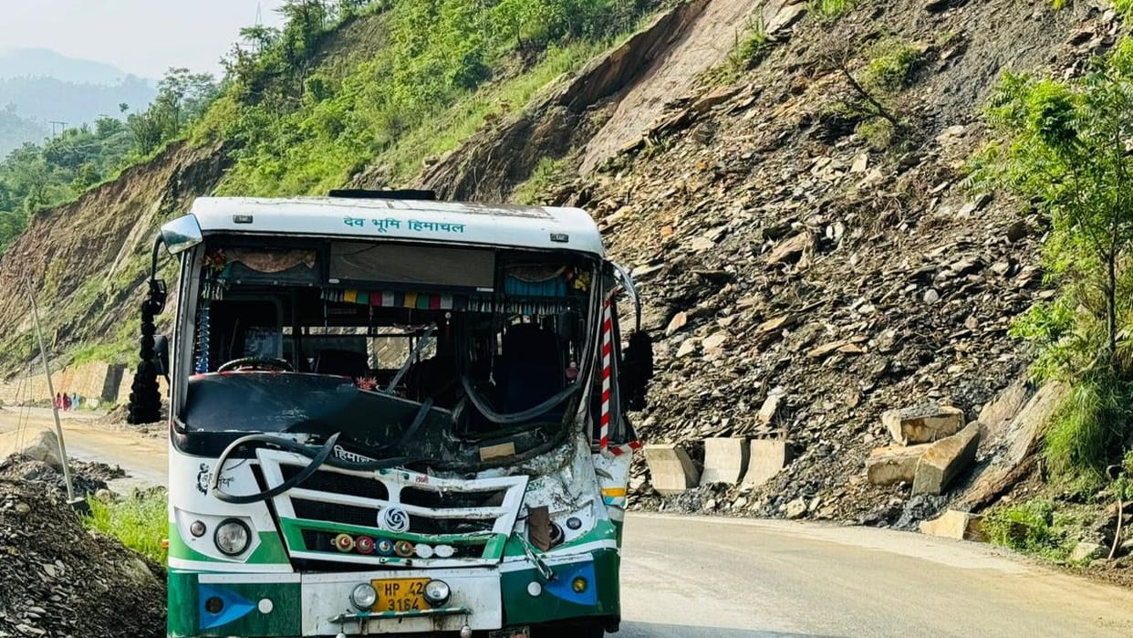 A rock fell on a moving HRTC bus near Nau Mile on the Chandigarh-Manali NH