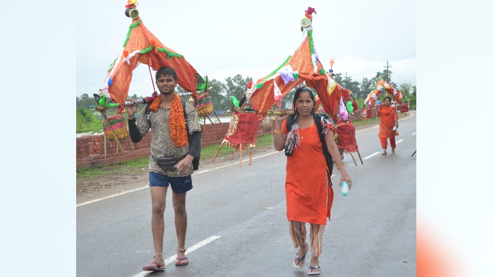Kanwar Yatra 2024 More Than Two lakh devotees collect gangajal from Haridwar on first day Photos