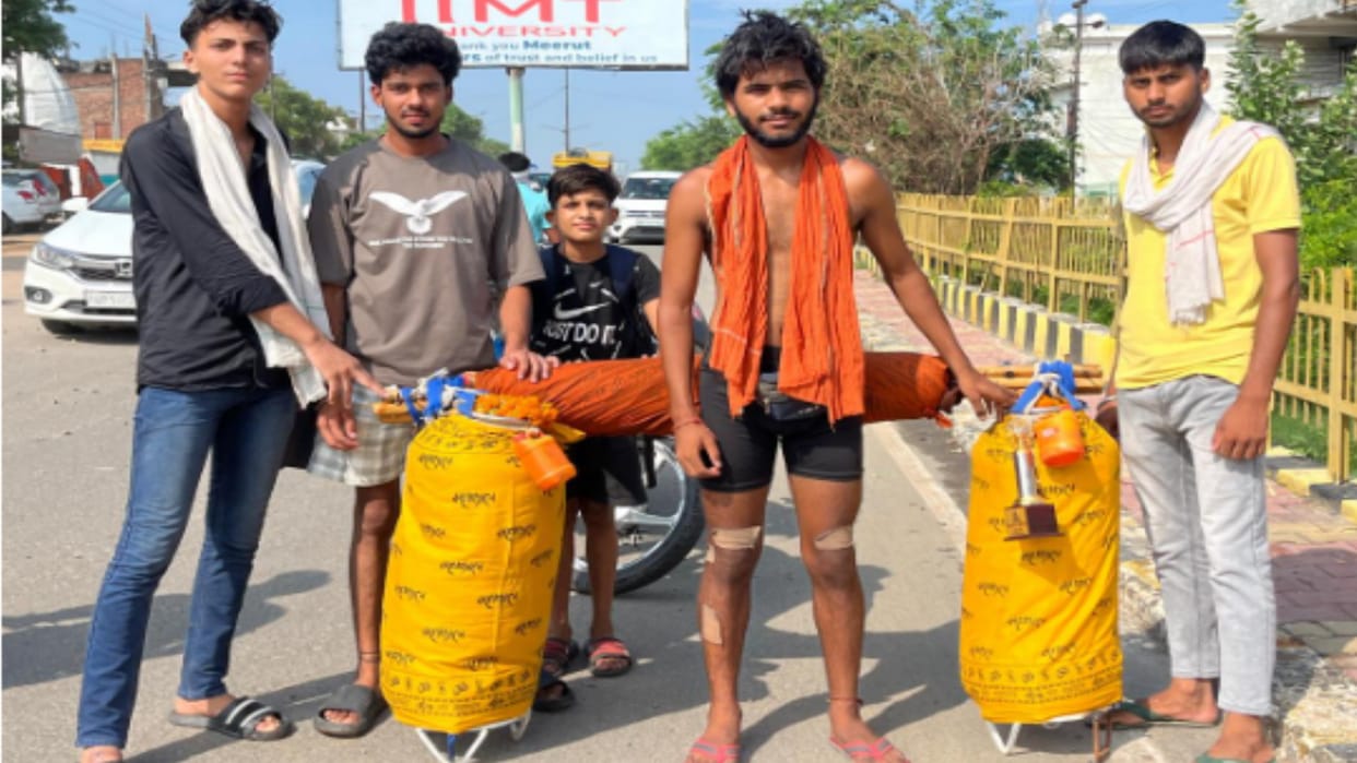 Kanwar Yatra: Chanting Bam Bhole and carryin 90kg's kanwar on his shoulders