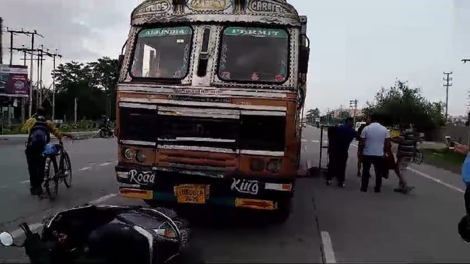 man riding a scooter dies after being crushed by a tanker in rudrapur