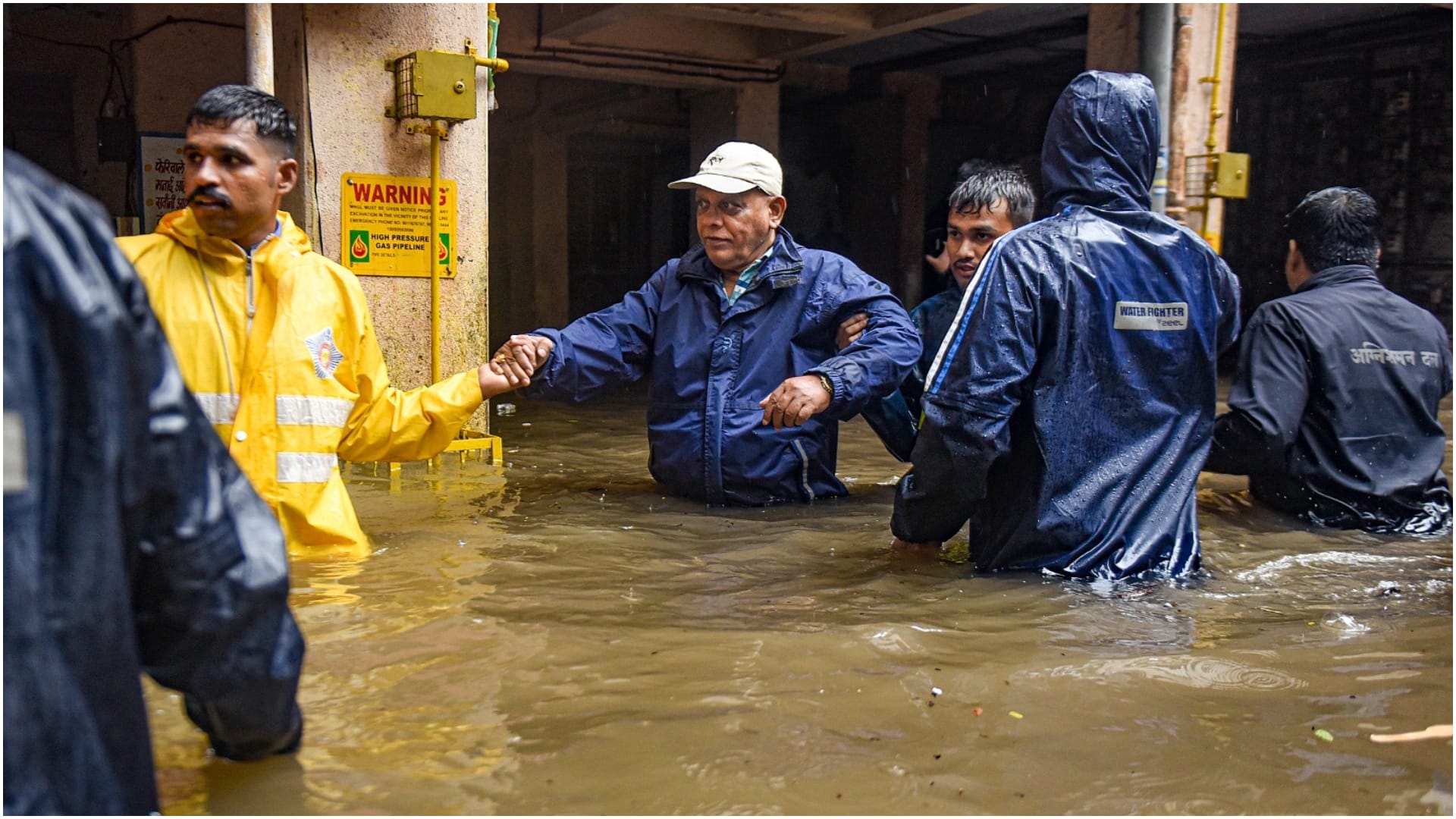 Heavy rain in pune thane maharashtra road closed bridge went under water
