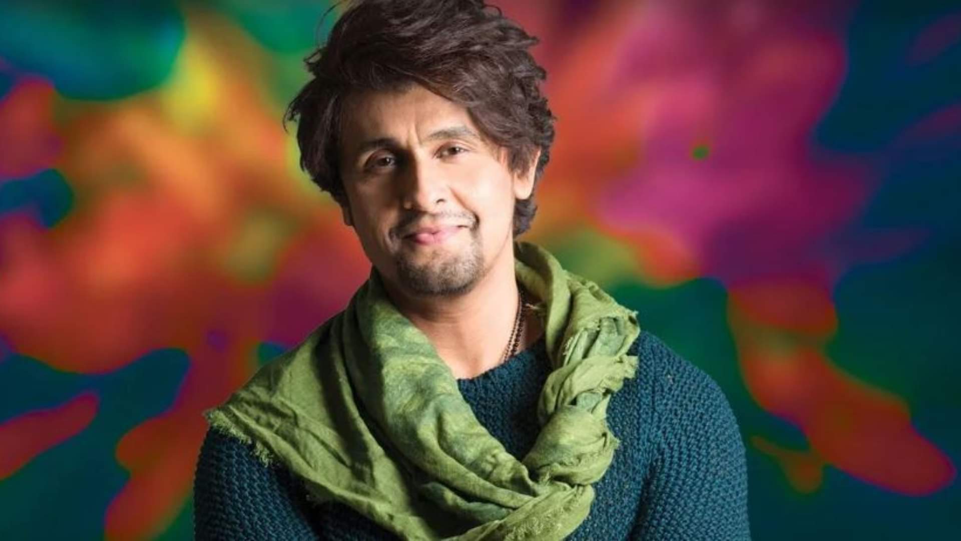 Sonu Nigam did not mess up even a note as a fan charged at him on stage The security escorted the miscreant
