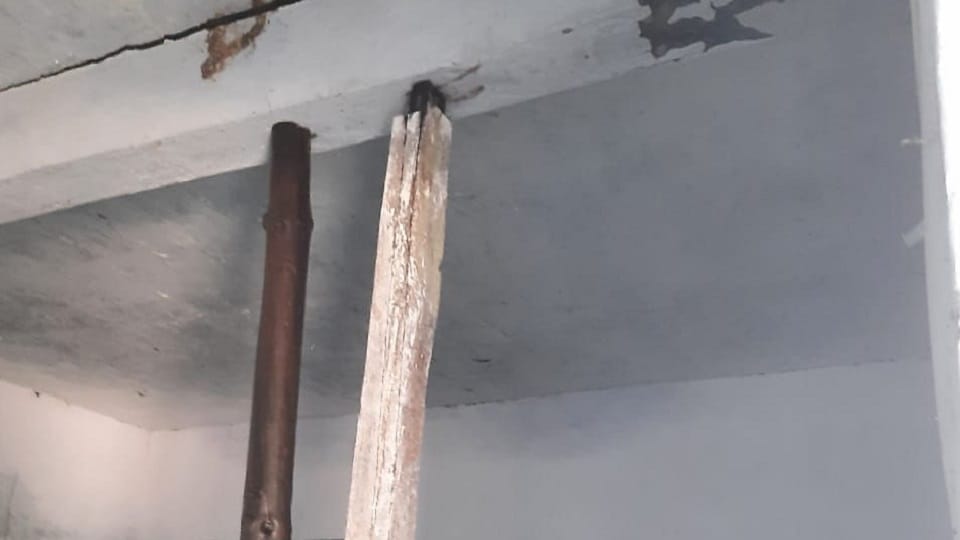The roof of Valni School rests on beams in almora