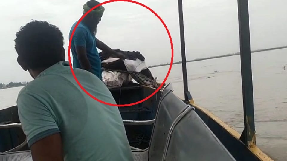 video of a girl body being thrown into the Ganga in a boat in Hapur goes viral